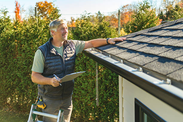 Professional Roof Replacement technician working in Reynolds, IL